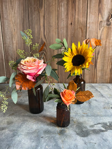 Trio of Amber Bottles with Flowers